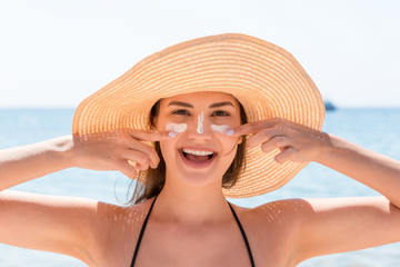 Girl wearing Hat and Sunscreen