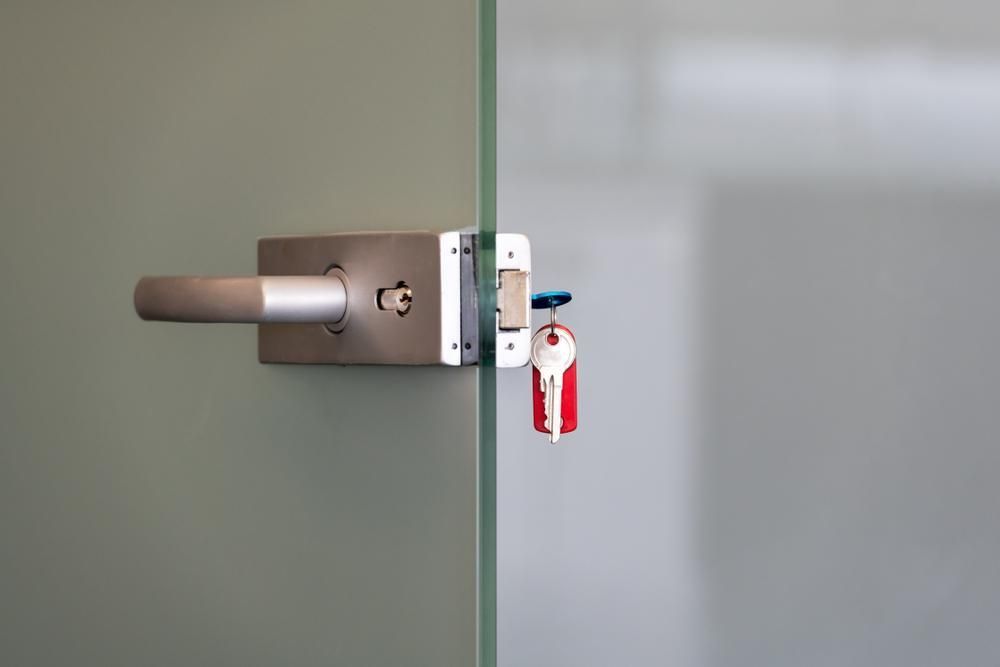 A Close up Of a Door with A Key in It — Fortress Locksmiths & Security in Alstonville, NSW