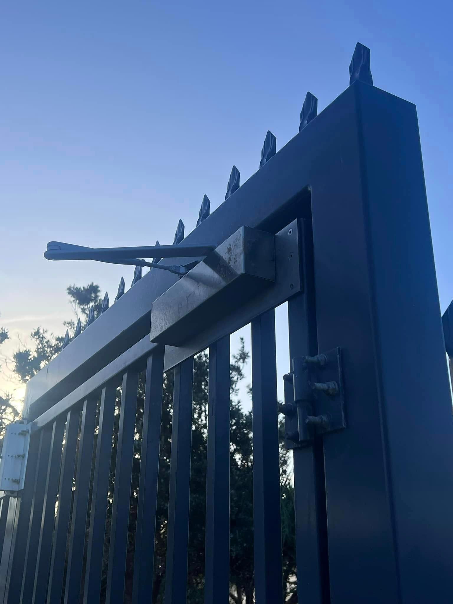 A Close up Of a Gate with A Lock on It — Fortress Locksmiths & Security in Lennox Head, NSW