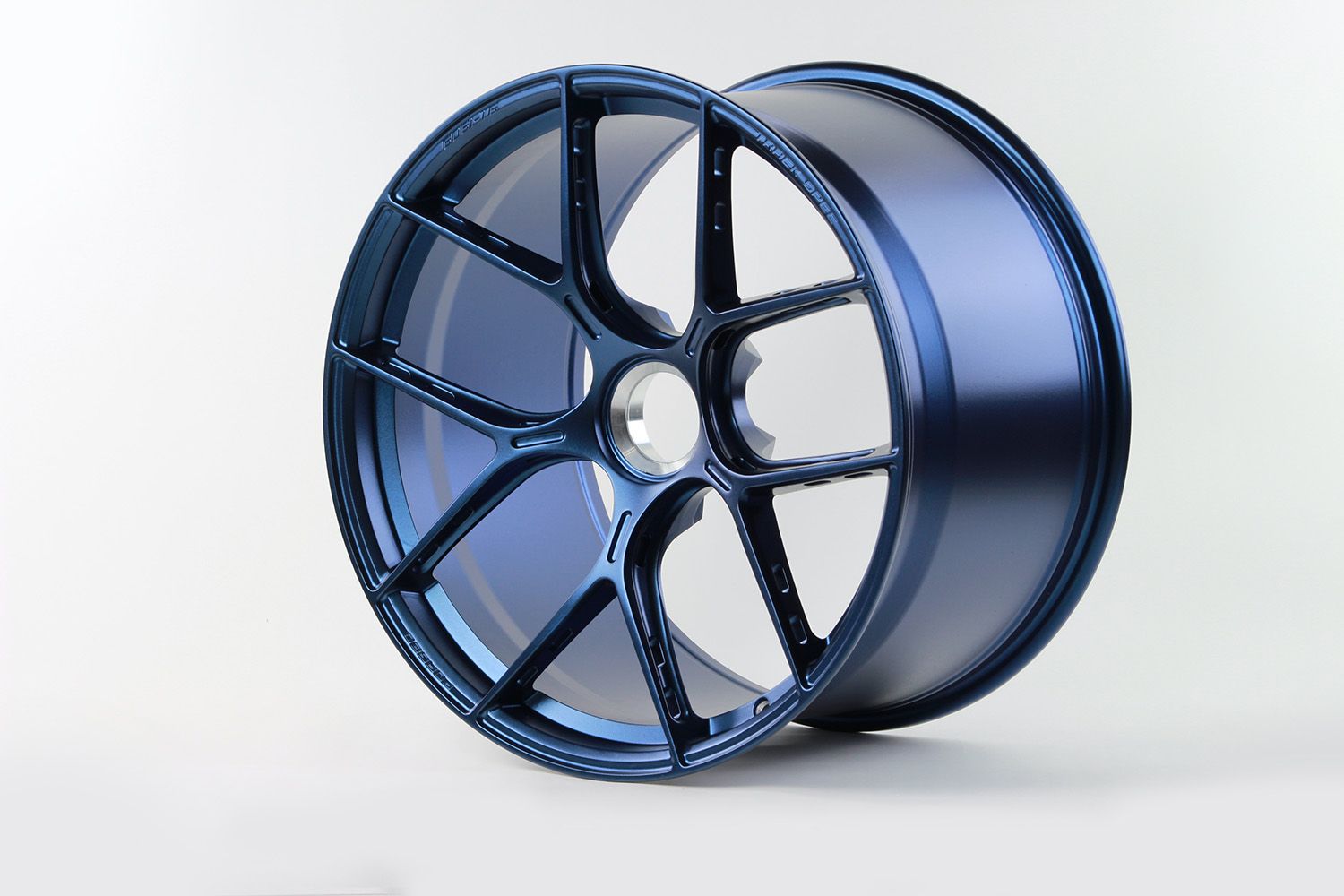 Blue alloy car wheel.