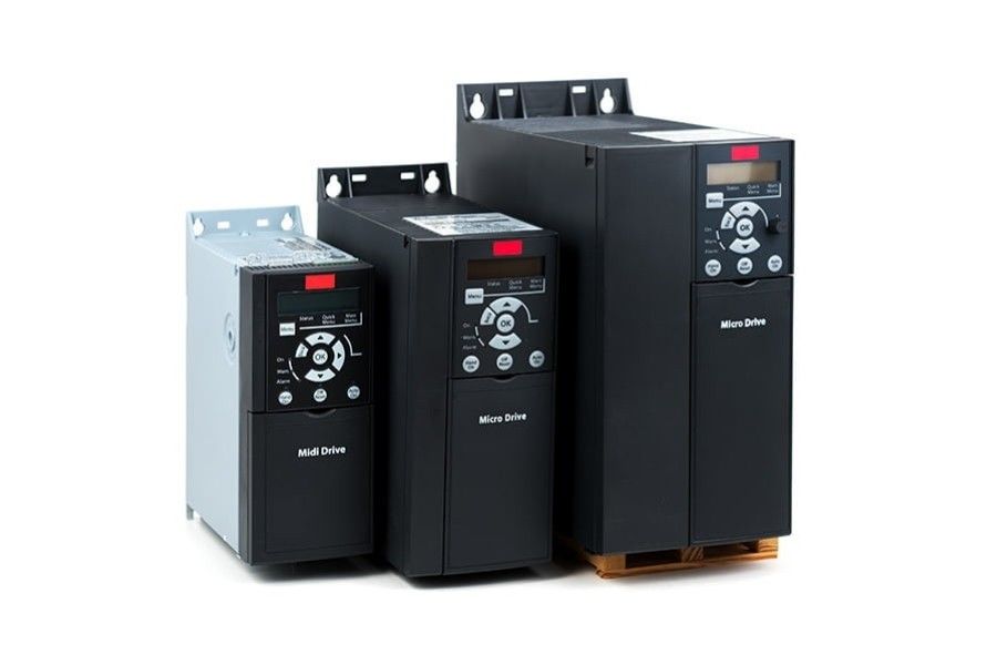 A group of three inverters sitting next to each other on a white background.