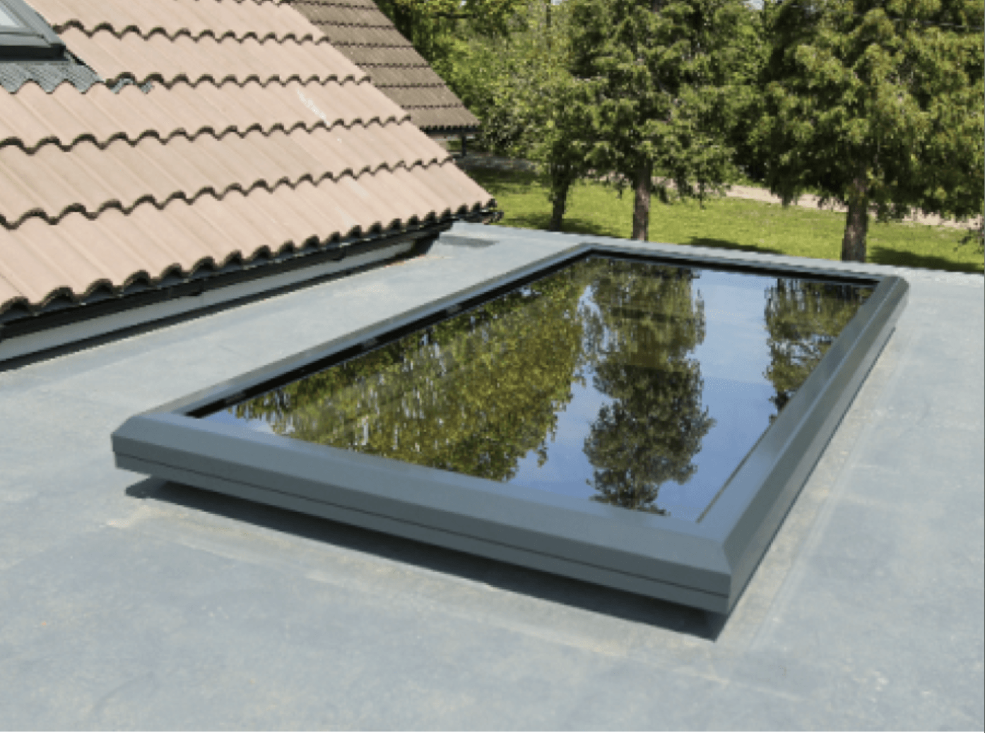 A large window on the roof of a house