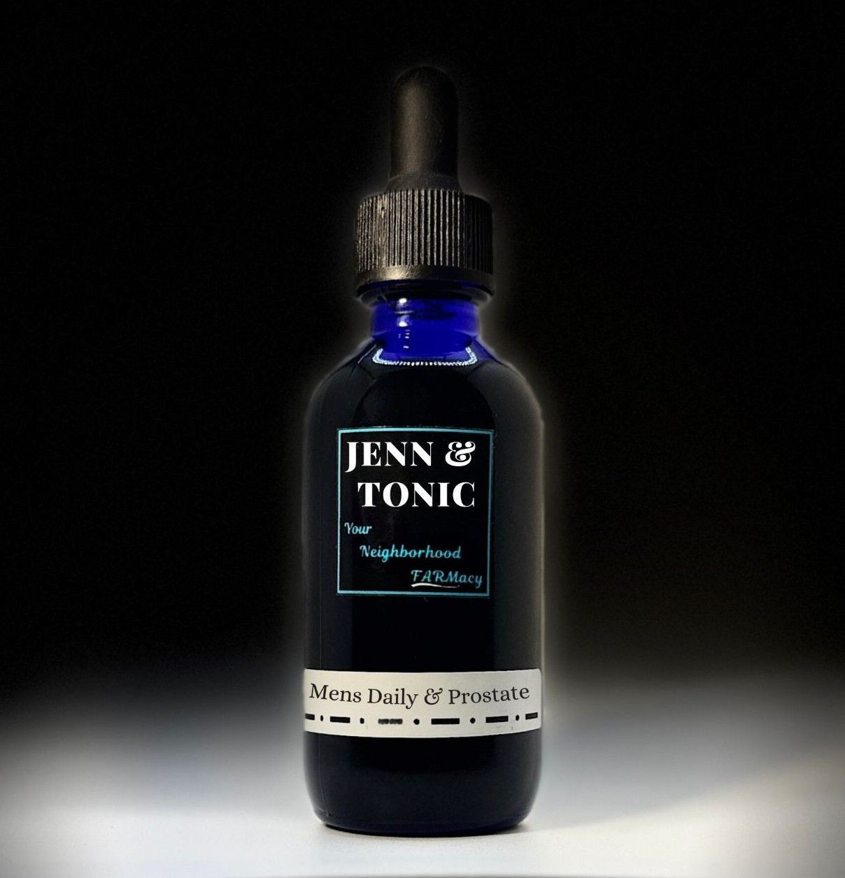 A bottle of jenn & tonic sits on a table