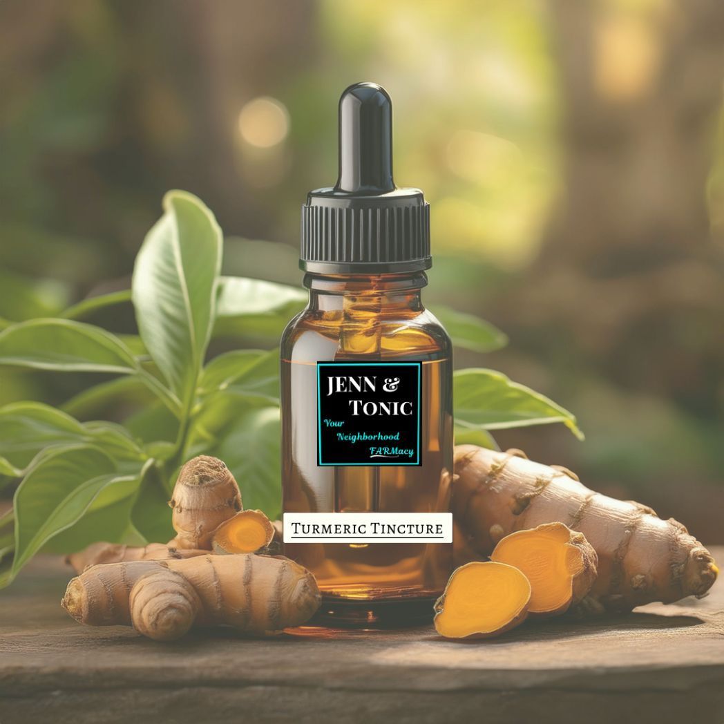 A bottle of jenn 's tonic surrounded by turmeric