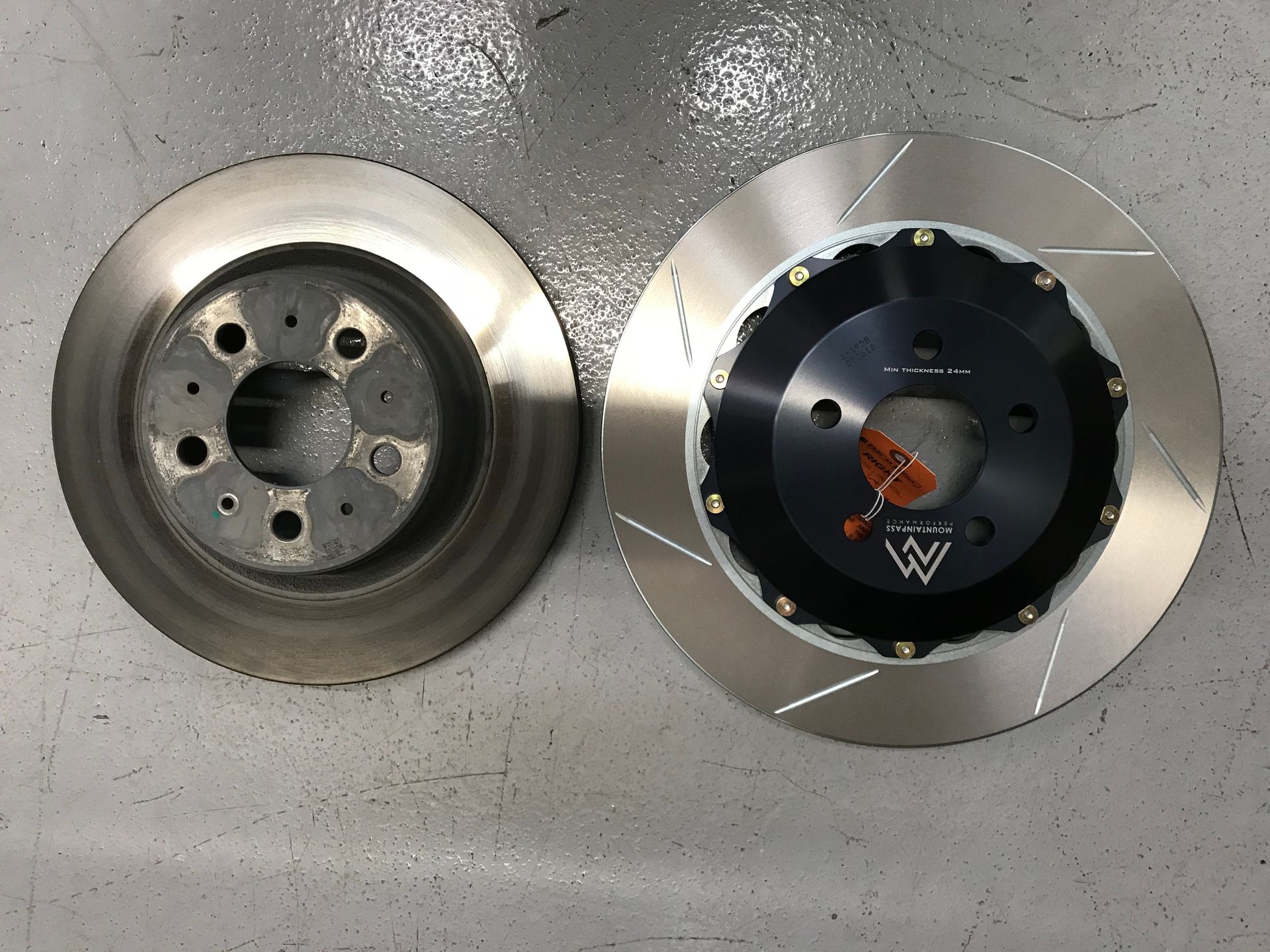 A pair of brake rotors with the letter w on them | Griffin Motorwerke