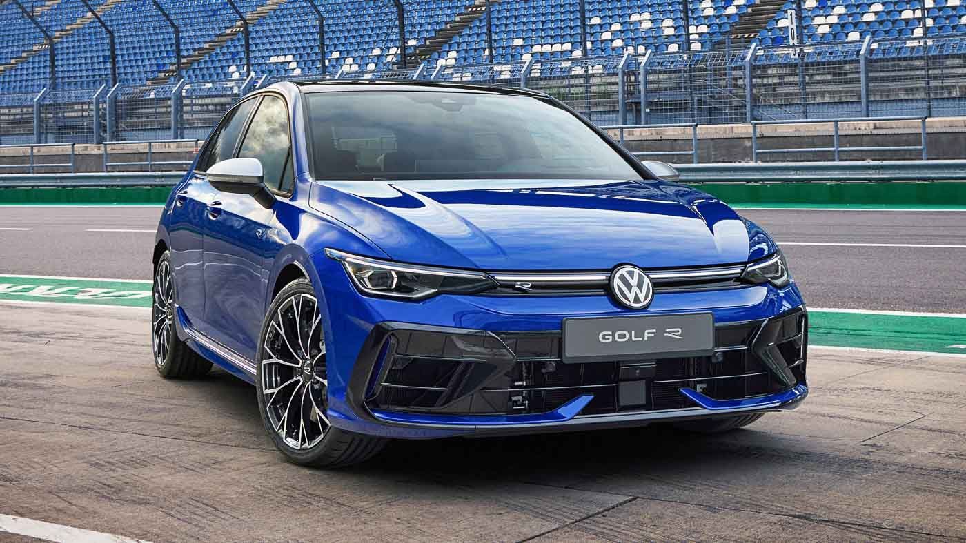 A blue volkswagen golf r is parked on a race track | Griffin Motorwerke