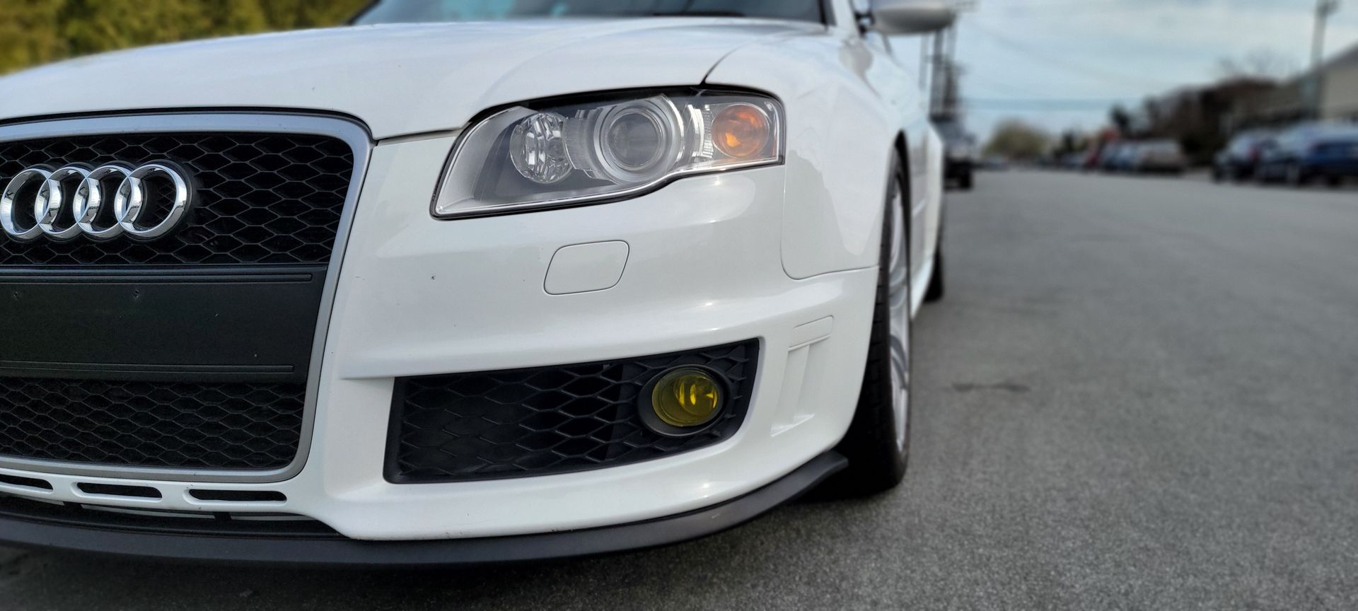 A white audi a4 is parked on the side of the road | Griffin Motorwerke