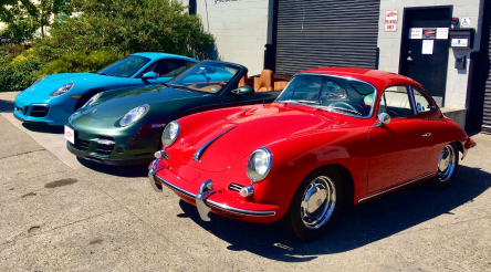 Three porsche cars are parked next to each other in a parking lot | Griffin Motorwerke