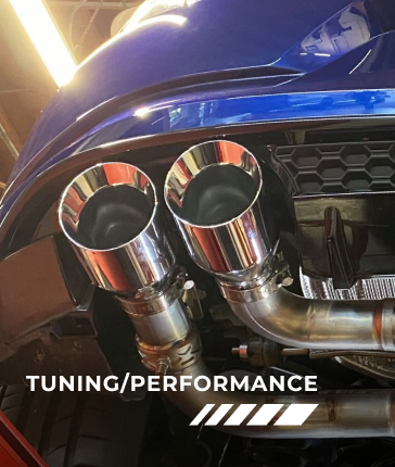 A blue car with chrome exhaust pipes says tuning / performance | Griffin Motorwerke