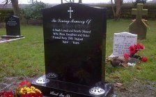 new inscriptions added on a memorial headstone