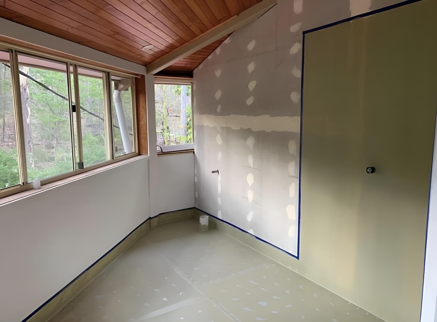 Empty Room With a Window and a Door — Luke Barry Plumbing in Surfers Paradise, QLD