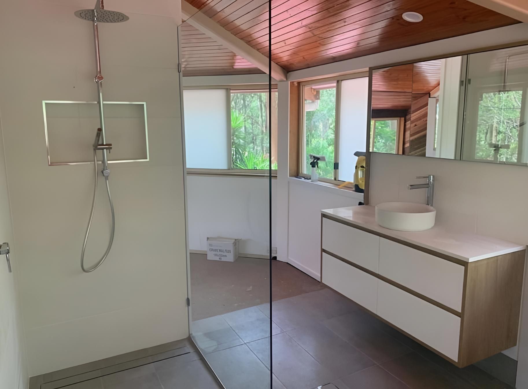Bathroom With a Sink, Shower and Mirror — Luke Barry Plumbing in Benowa, QLD
