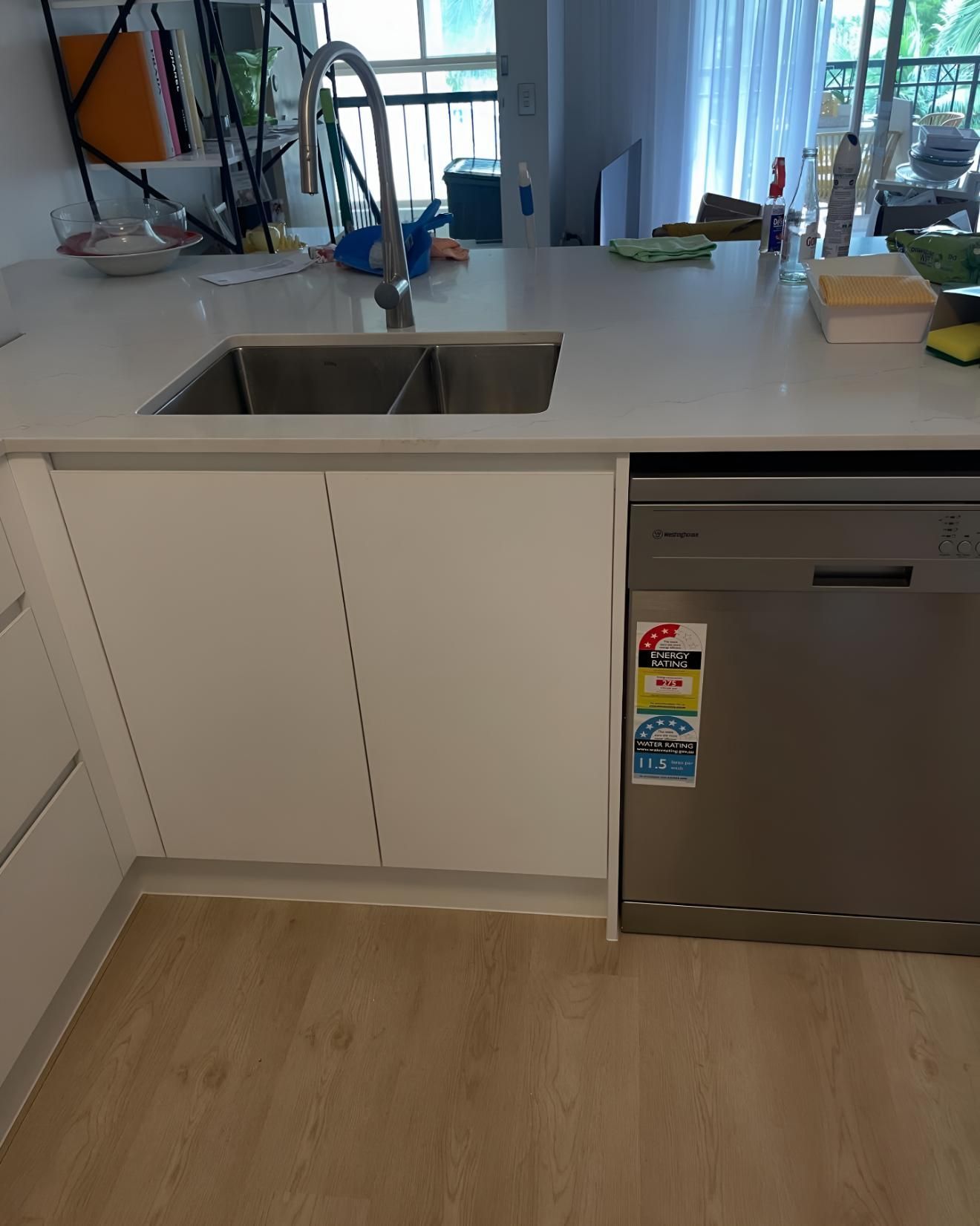 Kitchen With a Stainless Steel Dishwasher — Luke Barry Plumbing in Varsity Lakes, QLD