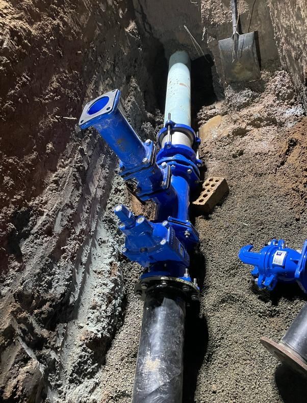 Pipe is Being Installed in a Hole in the Ground — Luke Barry Plumbing in Burleigh Heads, QLD