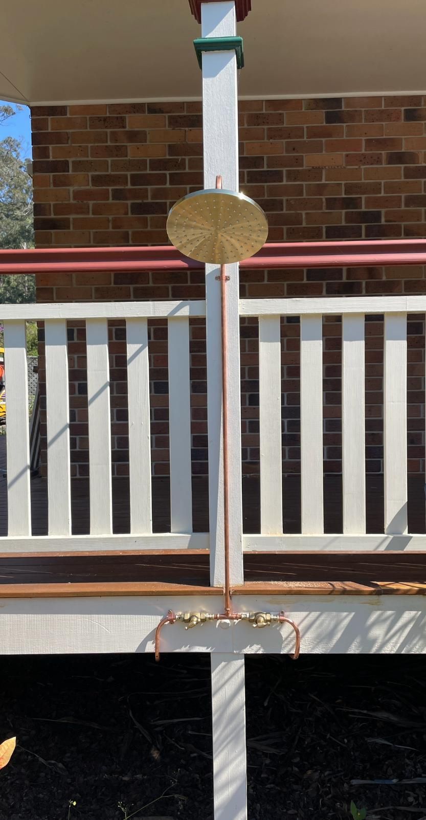 Porch With a White Railing — Luke Barry Plumbing in Mermaid Waters, QLD