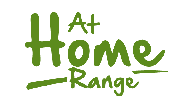 A green logo that says at home range on a white background