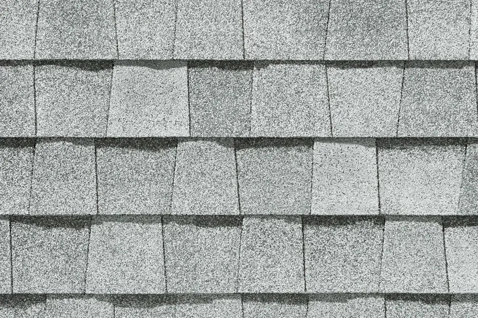A close up of a roof with shingles on it.