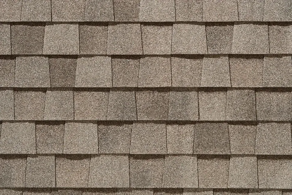 A close up of a roof with shingles on it.