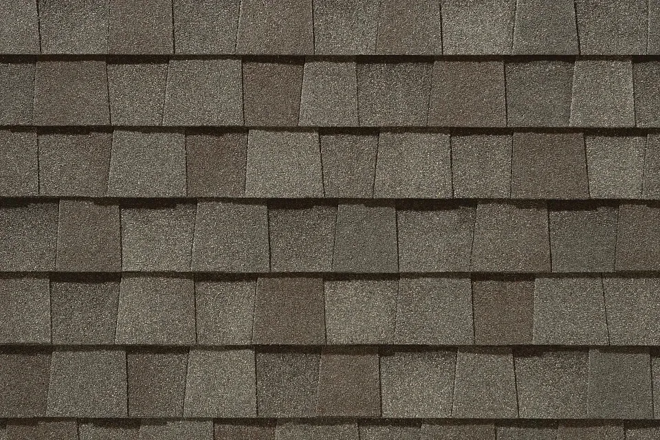 A close up of a roof with shingles on it.