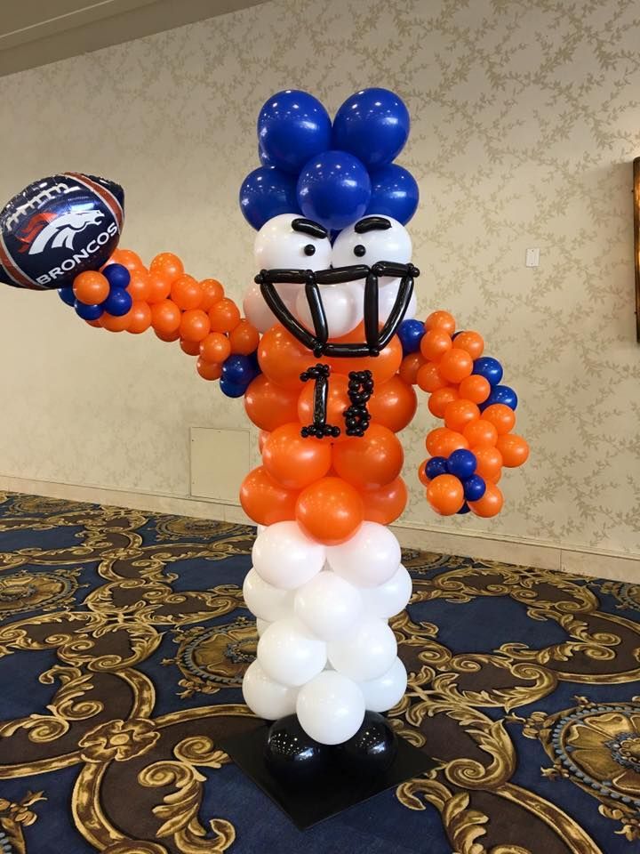 A broncos football player made out of balloons