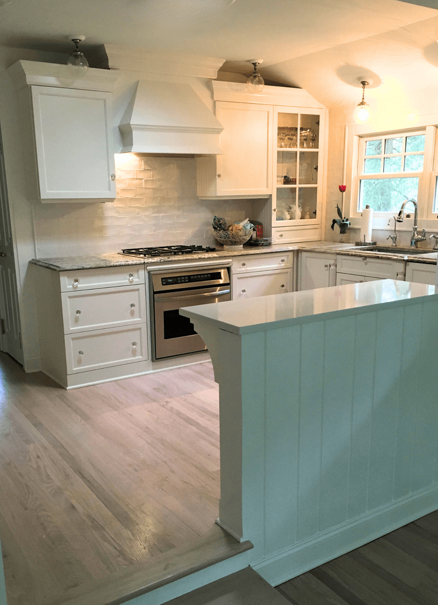 kitchen with cabinets and hood cover plus drawer storage