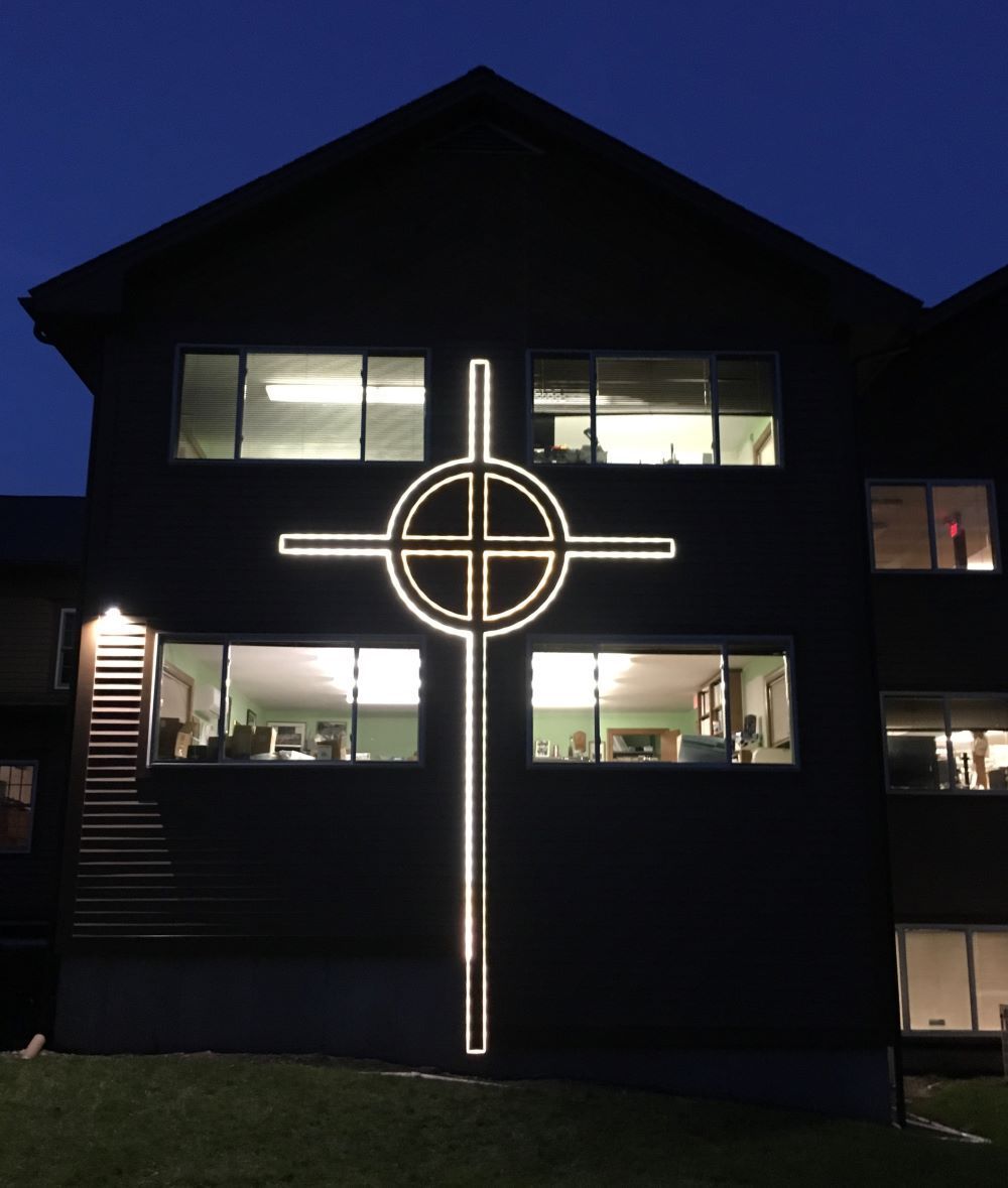 Church office building with custom built light up cross on the exterior