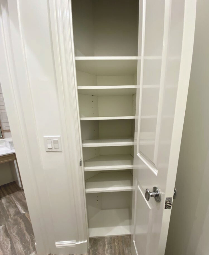 Using space available in bathroom for a small closet