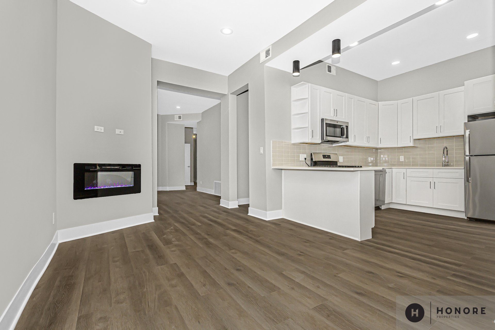 St Benedict Flats living room with hardwood floors