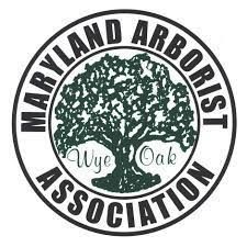 The logo for the maryland arborist association shows a tree in a circle.
