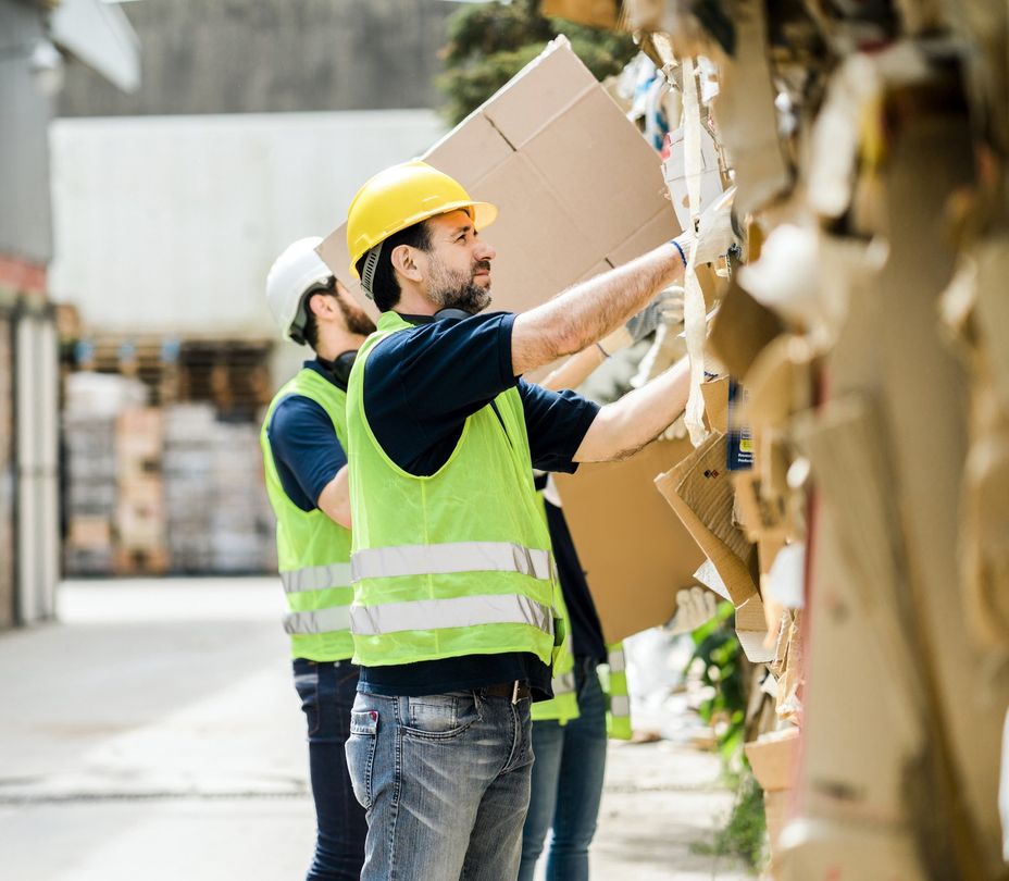 Men Working on Cardboard Recycling Center — Melbourne, VIC — All Ready Bulk Bins