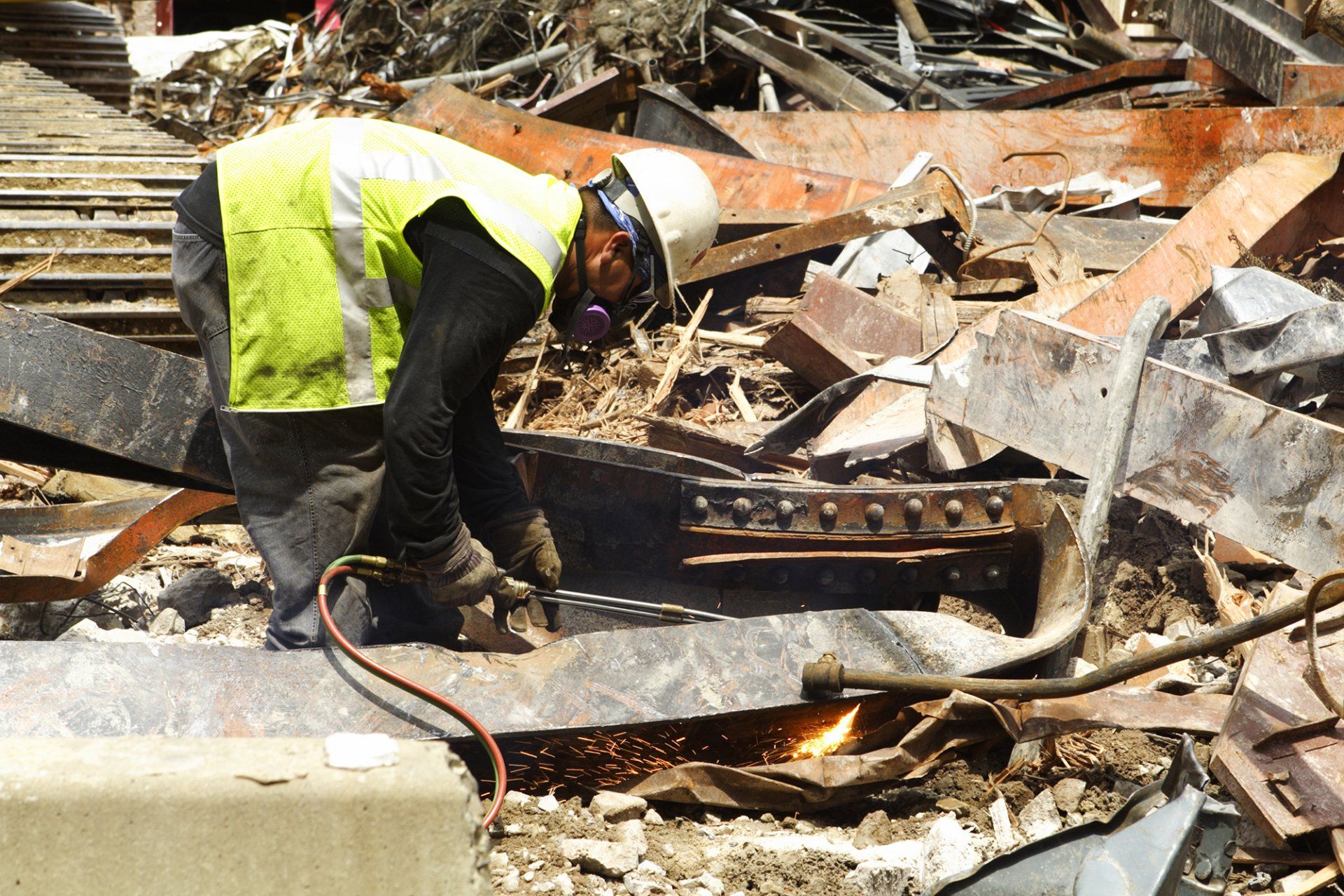 Worker Cutting Scrap Metal — Melbourne, VIC — All Ready Bulk Bins