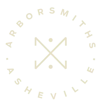 ArborSmiths Asheville logo: Cream-colored circle with the name and an