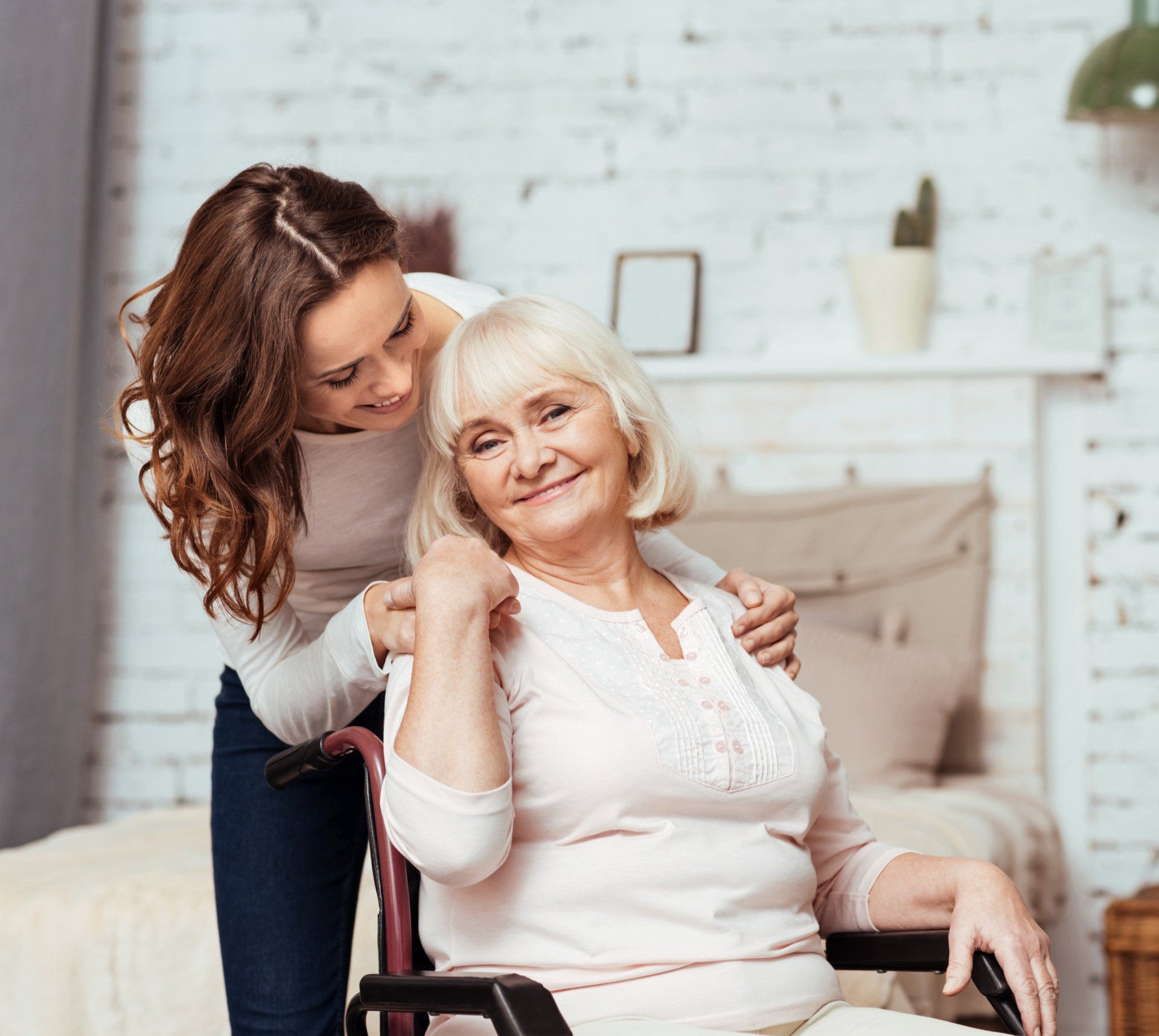 caregiver in Western MA caring for a older woman in chair