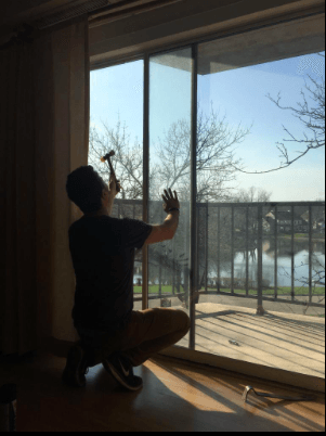 Repairing The Sliding Door — Palatine, IL —  Sliding Door & Window