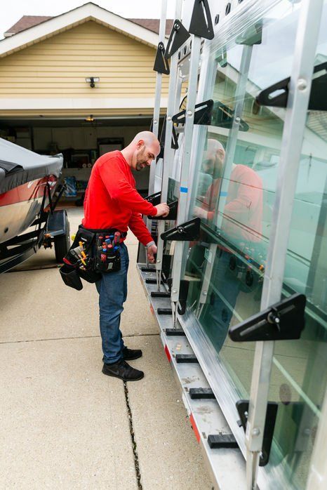 Man Building A Glass — Palatine, IL —  Sliding Door & Window