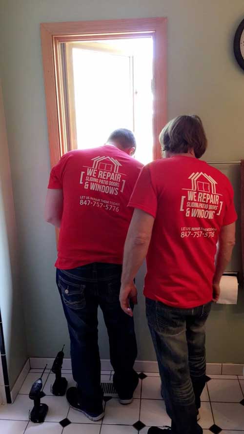 Two Man Replacing Glass — Palatine, IL — Sliding Door & Window