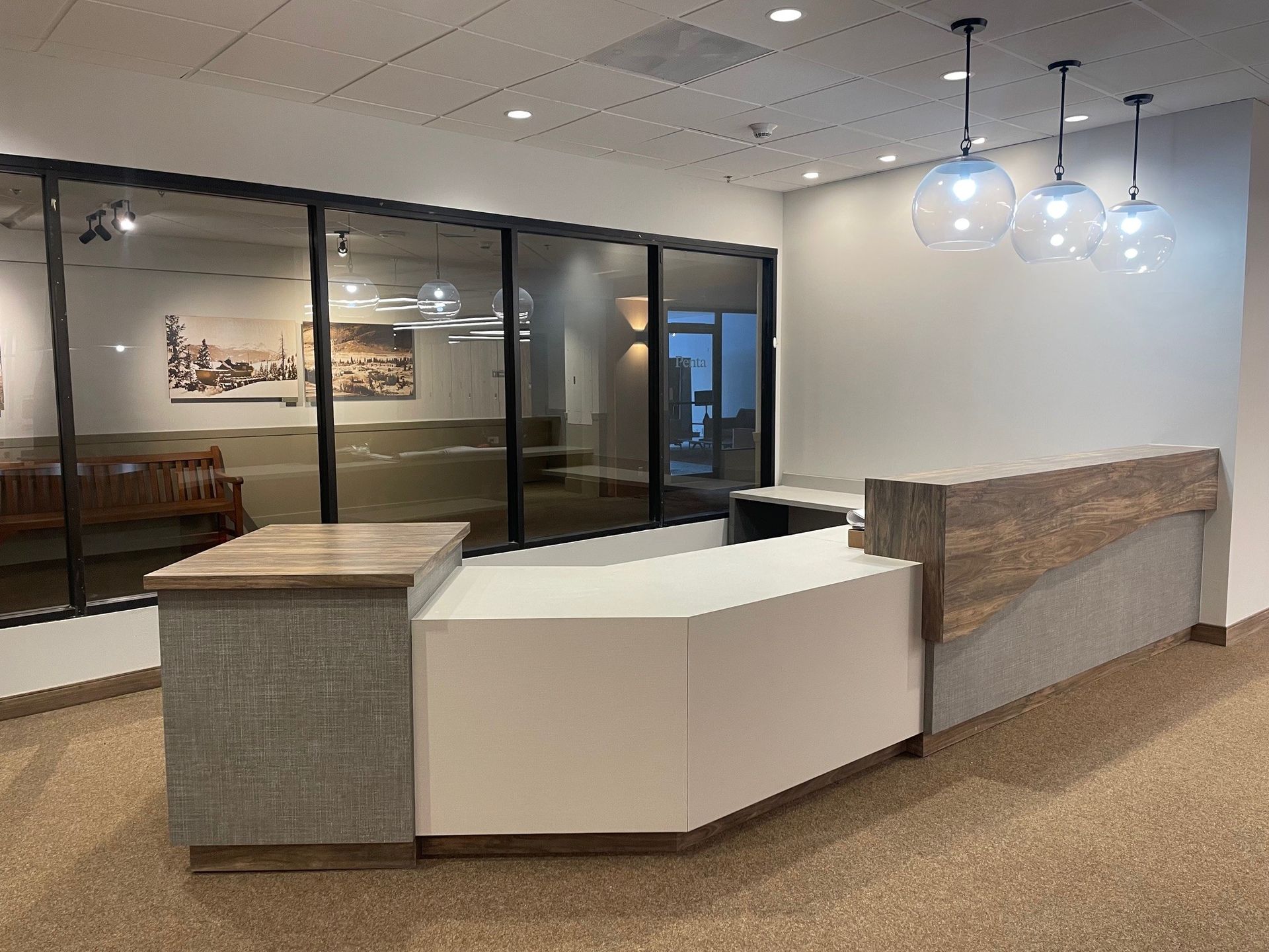 Bluebird Ski Lockers reception area with a white counter and a wooden counter.
