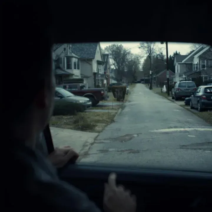 Private investigator Huntsville AL examining local area map for surveillance planning