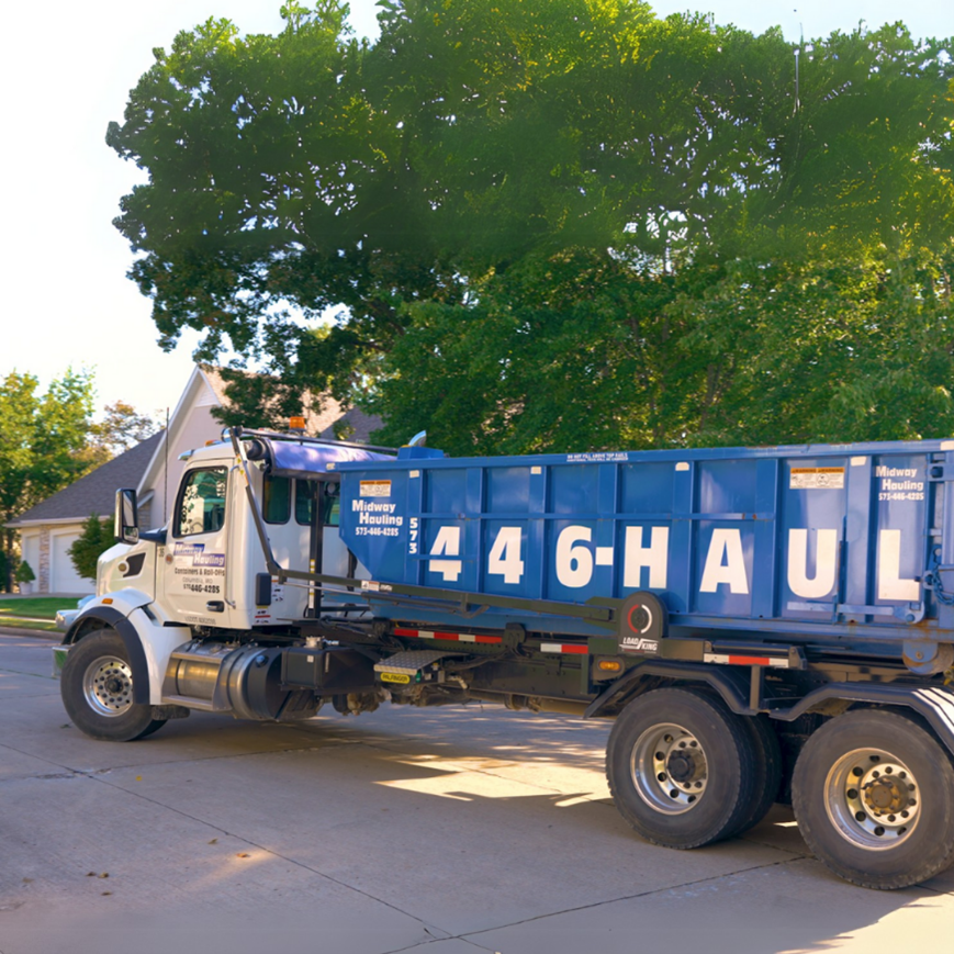 A blue truck on the street A blue truck on the street