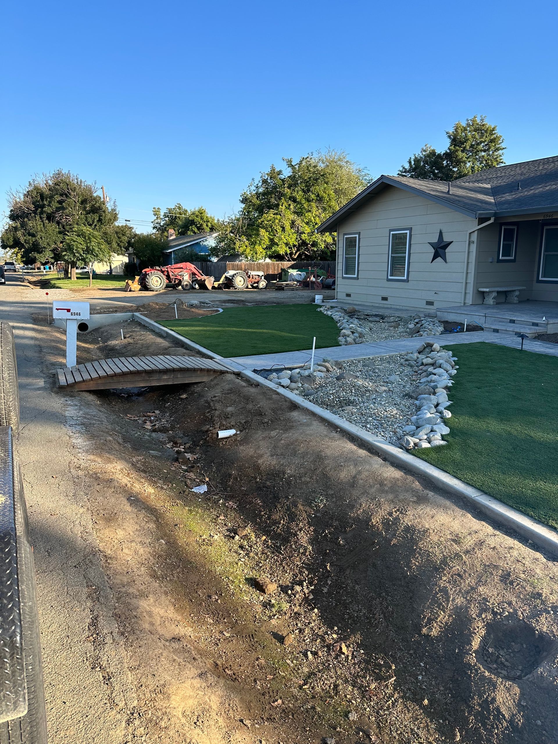 A house with a star on the side of it is being built.