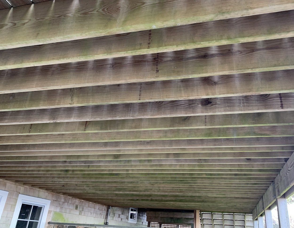 cleaning under a deck