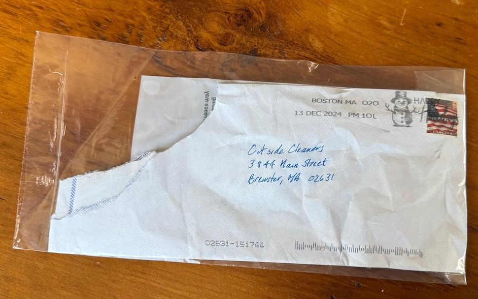 a check damaged by the USPS
