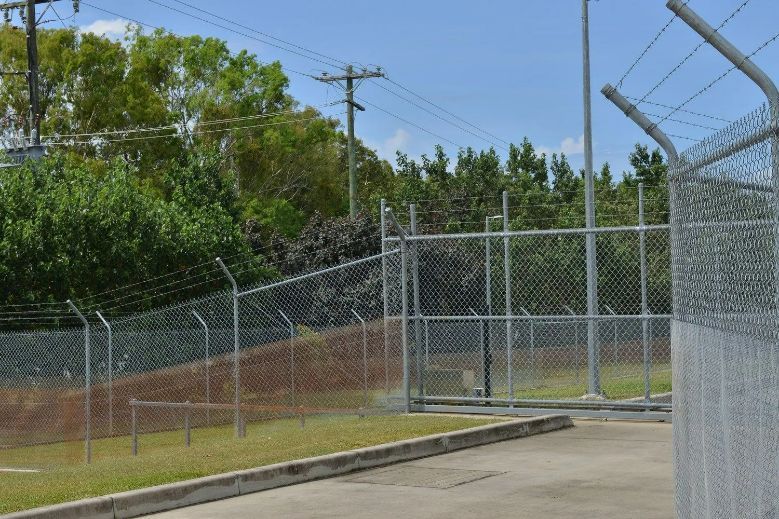 A Fenced Area with Power Lines — Fences in Bentley Park, QLD