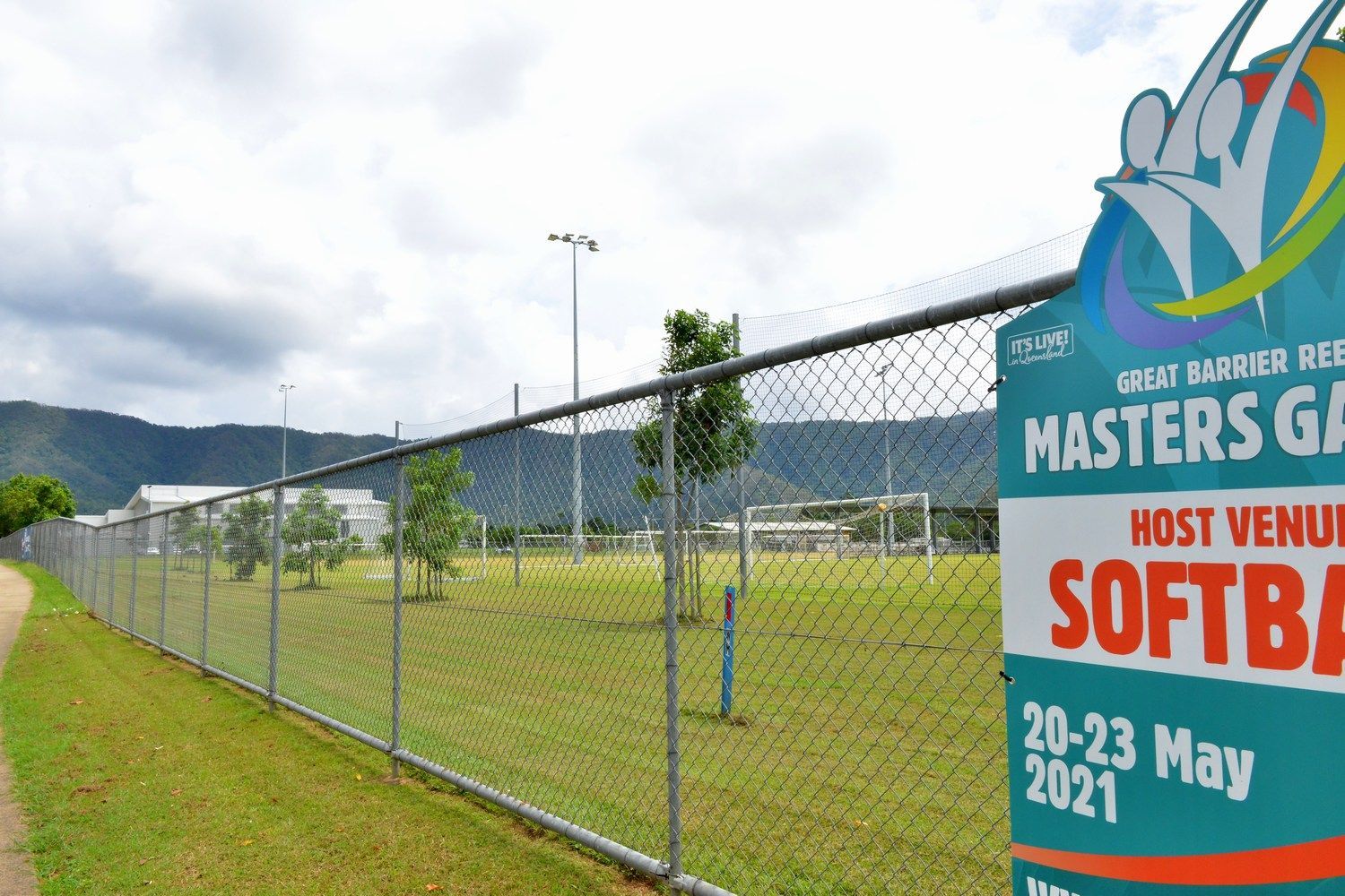 Chain-Link Fence Beside A Grassy Sports Field