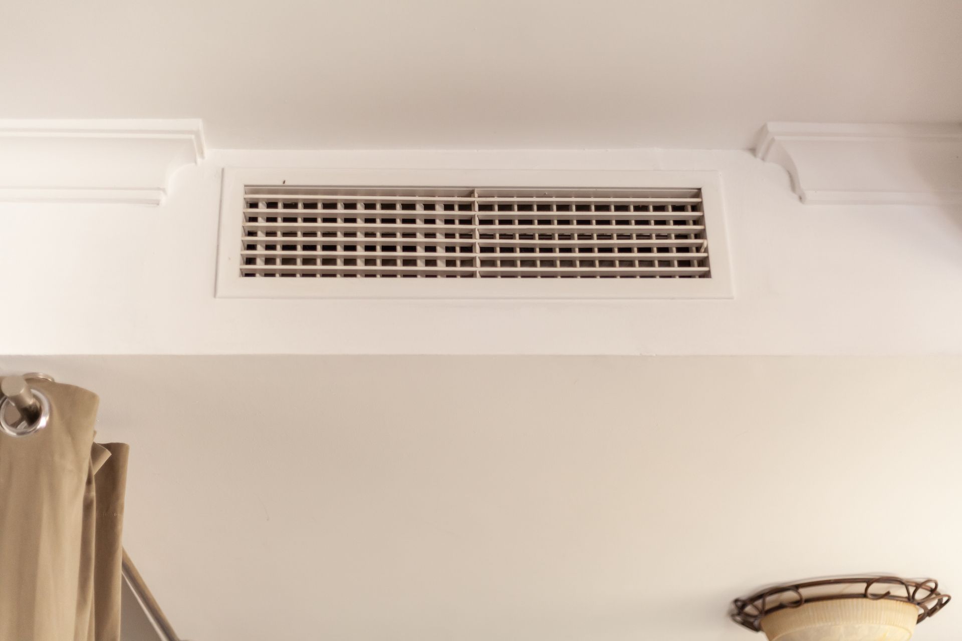 Heat pump at home with smart grilles for air conditioning, energy-efficient HVAC system