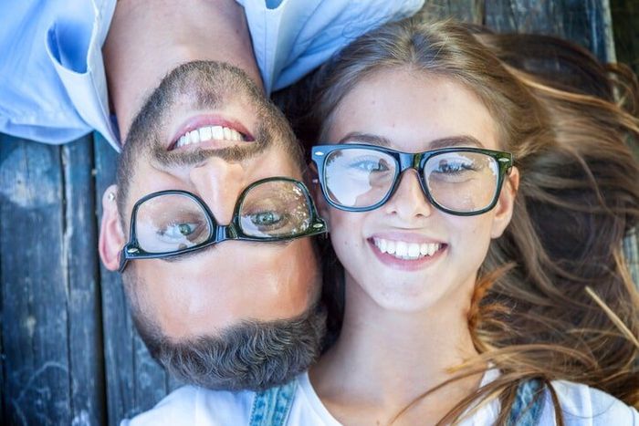 Young adults wearing eyeglasses — Optometrist in Englewood, FL Young adults wearing eyeglasses — Optometrist in Englewood, FL