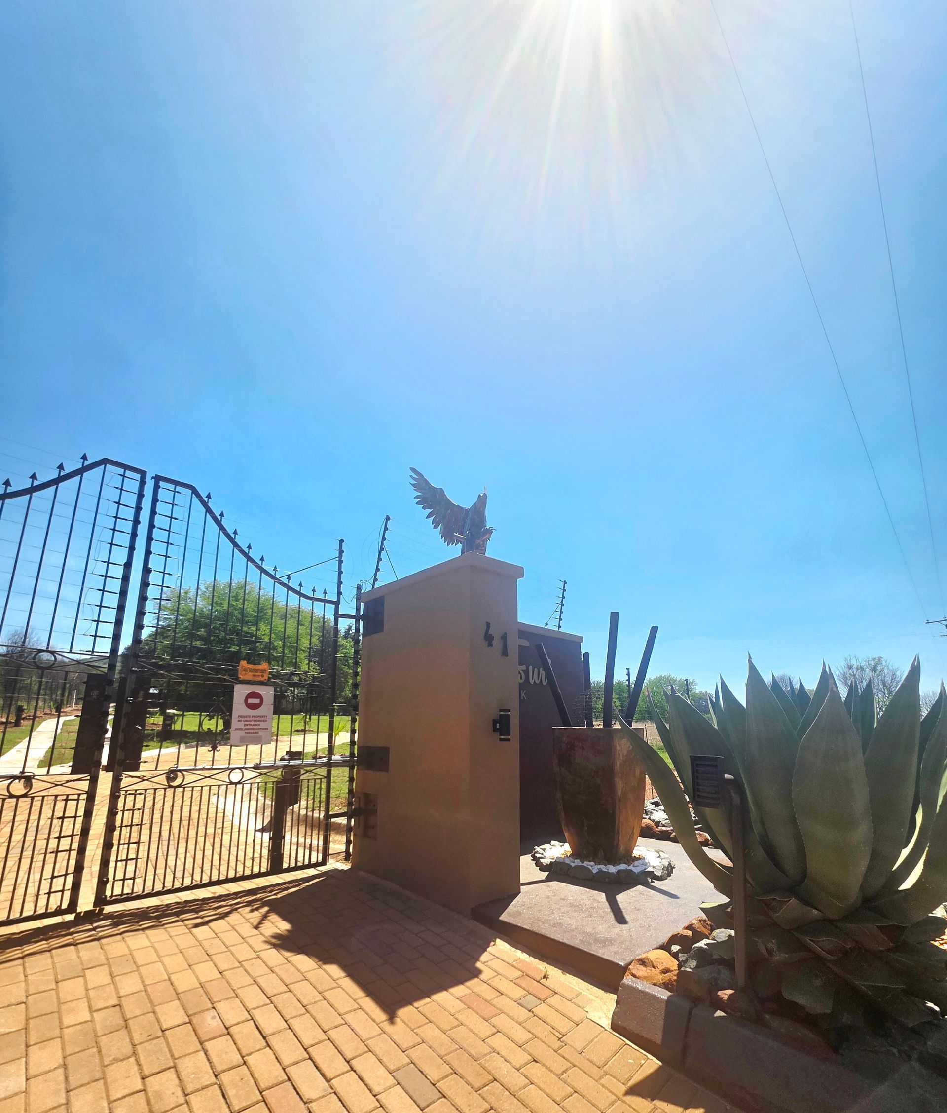 Electric fence and secure gated access at El-Tsuri Guest Resort in Hartbeespoort, providing safety and privacy for guests.