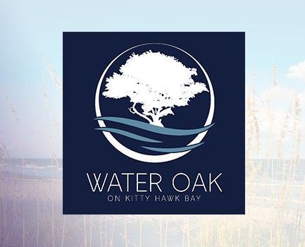 A dining room with a table and chairs and a wooden staircase.