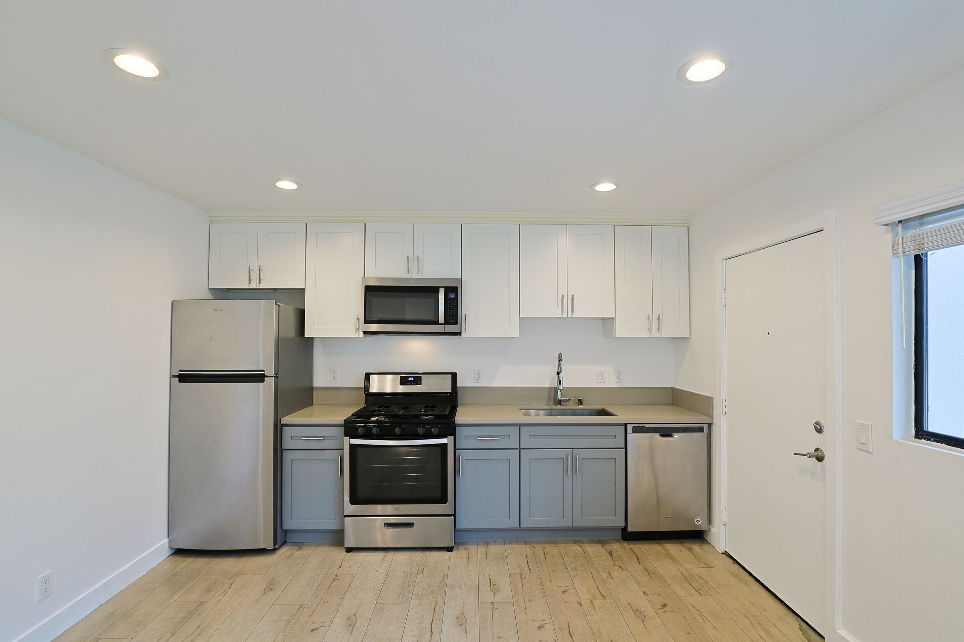 Thi image showing a kitchen with accessories in it.