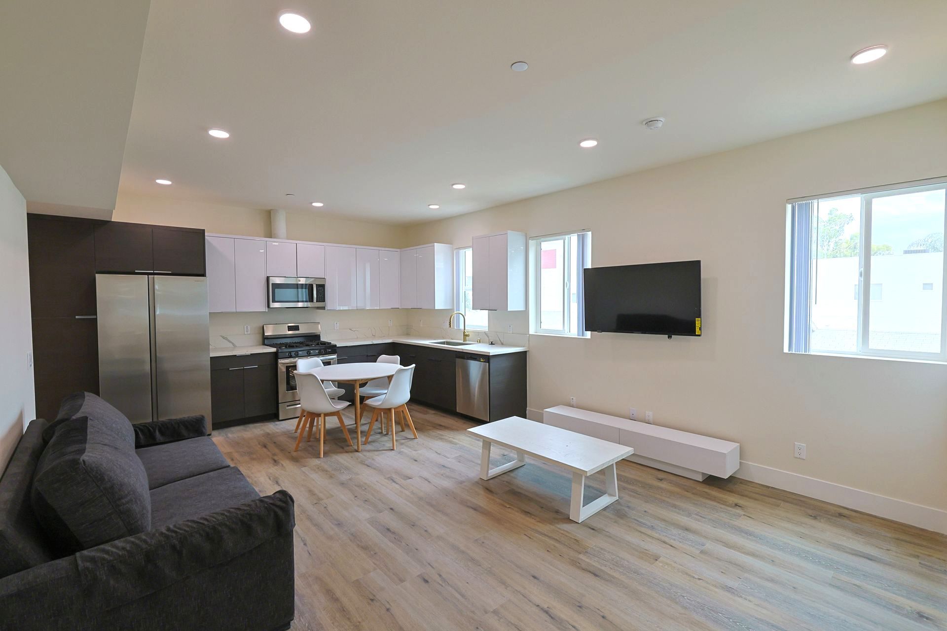 This image shows luxury living room with a couch and a table